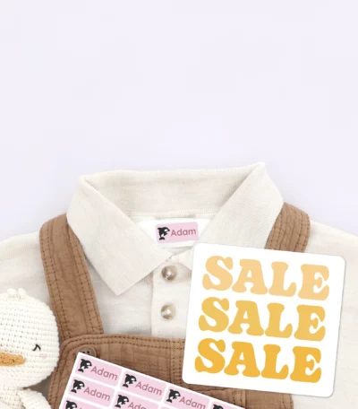 Winter-themed promotion featuring personalized name labels for kids' clothing and boots, showcasing a sale for children's products.