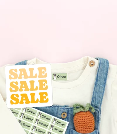 Personalized name labels on children's overalls and shoes with a sale sign on a pastel background, perfect for customizing kids' clothing.