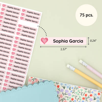 Personalized name labels featuring 'Sophia Garcia' with a heart design. Each label measures 1.57” x 0.24” and comes in a pack of 75. Ideal for children's belongings, ensuring easy identification and stylish organization.