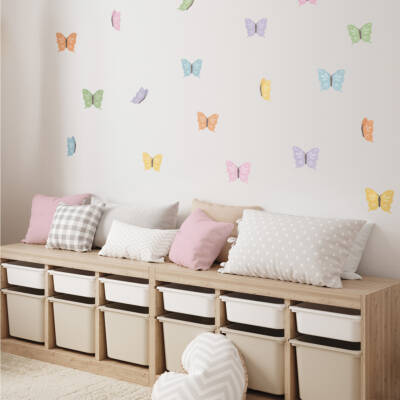 A kids’ room decorated with pastel butterfly wall decals.