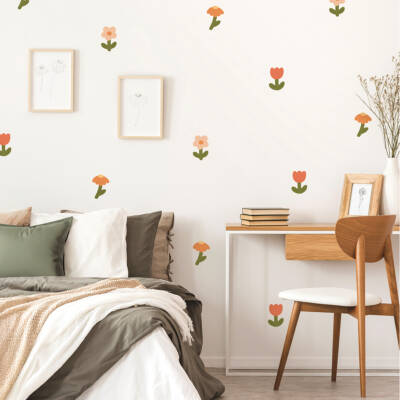 A beautifully decorated children's room featuring colorful flower wall decals, cozy bedding with an earthy palette, and stylish decor elements. Perfect for creating a playful and inviting space for kids, showcasing how wall stickers can transform a room's atmosphere. Ideal inspiration for parents looking to enhance their child's bedroom with vibrant decorations.