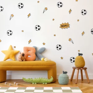 Bright and playful children's room featuring wall decor with soccer ball designs, stars, and fun phrases. A cozy yellow bench displays colorful plush toys and decorative pillows, creating an inviting atmosphere for kids. Ideal inspiration for unique children's wall art and home decor. Perfect for birthday celebrations, enhancing creativity in children's spaces.