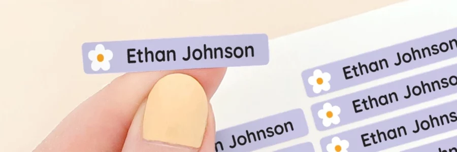 Personalized name tags in pastel colors featuring the name 'Ethan Johnson' alongside decorative elements, ideal for children's organization and identification. Perfect for school use or playdates.
